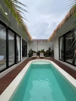 a pool in the backyard of a villa at Ametys 1 Villa - Cozy 2BR Villa with Private Pool & Prime Seminyak in Seminyak
