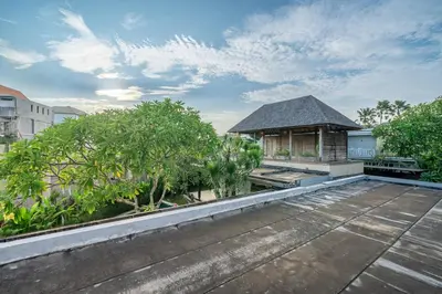 a view from the roof of a house with trees at Lux Ayuni Big Modern 2BR Designer Villa Berawa in Canggu