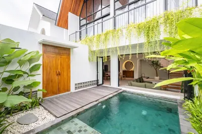 an external view of a house with a swimming pool at 2BR Villa in Canggu, Villa Sejiwa 3 in Canggu