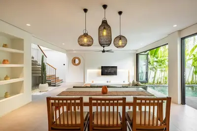 a dining room with a table and chairs at 2BR Villa in Canggu, Villa Sejiwa 3 in Canggu