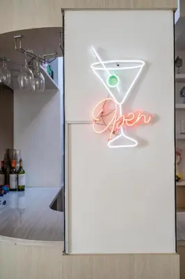a white refrigerator with an open sign on it at Villa Azure 2 - Private Pool Villa near Seminyak Centre in Seminyak