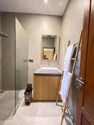 a bathroom with a sink and a shower at Villa in South Kuta Dewi Amerta villa in Jimbaran