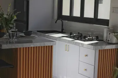 a kitchen with a sink and a counter top at Villa Lisa - 3BR with pool Near Bali Mall Galleria in Kuta