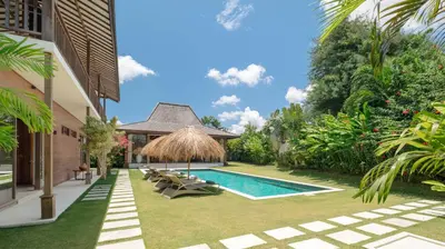 an image of a backyard with a swimming pool at Alea Estate by Villa Finder in Kerobokan