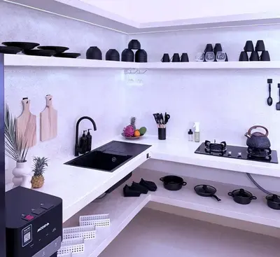 a kitchen with a sink and a stove in it at Luxury Villa Grand Sanur in Sanur