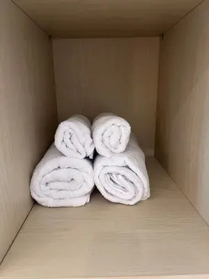 a group of towels sitting in a box at Summerville Homes in Canggu