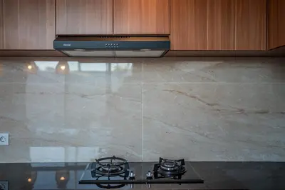 a stove top in a kitchen with a counter top at Villa Lotus Seminyak in Seminyak