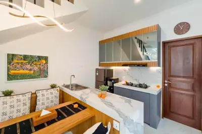 a kitchen with a sink and a counter top at Ghayda Entire 3 BR Private Pool Villa in Seminyak