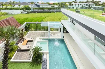 an aerial view of a house with a swimming pool at Tanaya Luxury 4 BR Private Pool Villa in Canggu