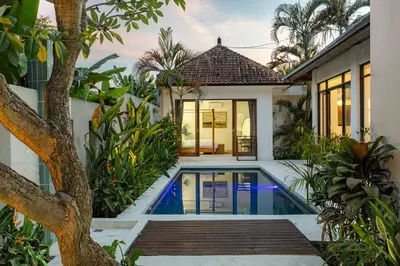 an external view of a villa with a swimming pool at Ola - Private Villa - Umalas in Kerobokan
