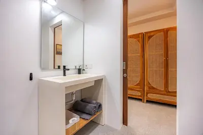 a bathroom with a sink and a mirror at Ola - Private Villa - Umalas in Kerobokan