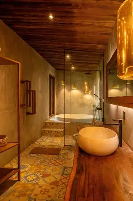a large bathroom with a tub and a shower at Tuluscoliving Villa Kuta 3, 3 Bedroom & 3 Bathroom in Ngurah Rai International Airport