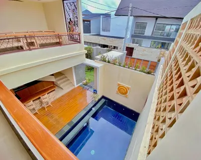 an overhead view of a house with a swimming pool at quiet and comfortable villa in sanur kauh in Sanur