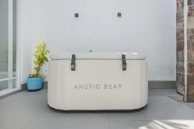 a large white cooler sitting on a floor next to a window at Xxtra Villa in Seminyak