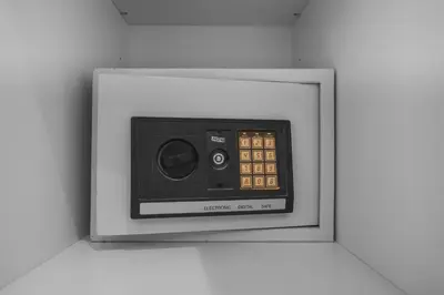 a digital clock in a white box on a wall at Xxtra Villa in Seminyak