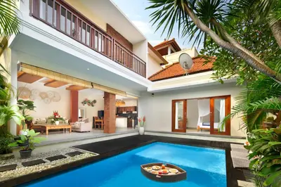an image of a villa with a swimming pool at Red Lotus Seminyak Villa in Seminyak