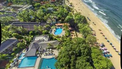 an aerial view of a resort and a beach at Jayakarta Bali Apartments in Seminyak