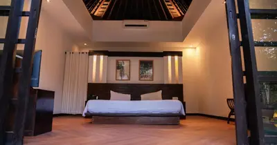 a bedroom with a bed in a room at Villa Nata Umalas in Seminyak