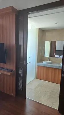 a bathroom with a sink and a mirror at Villa Don Bose 8 in Jimbaran