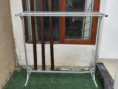 a window with a iron gate in front of it at Royal villa nusa dua quiet 2BR with public pool in Nusa Dua