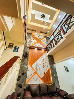 a view of a living room with a couch at Private 5BR Jimbaran House with Pool, up to 12 Pax in Jimbaran