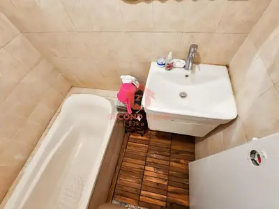a bathroom with a sink and a toilet and a tub at Strategic 2BR Seminyak House UP2 6 Person in Seminyak