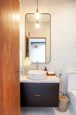 a bathroom with a sink and a mirror at Villa Kenia 1 in Umalas, near Canggu in Canggu