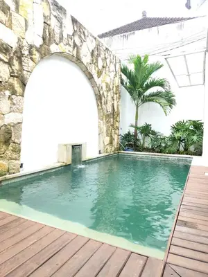 a swimming pool in a villa with a swimming poolvisorvisorvisor at Coconut Villa in Kerobokan
