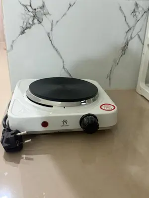 a toaster sitting on top of a table at Private Room In Bali 10Mints To Sanur Beach in Sanur