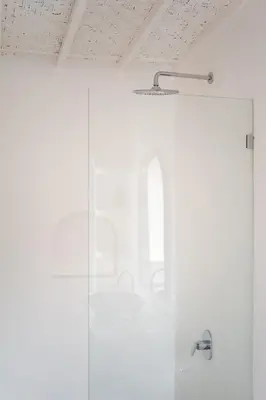 a bathroom with a shower and a sink at Charming 3 BR villa in the heart of Umalas in Canggu