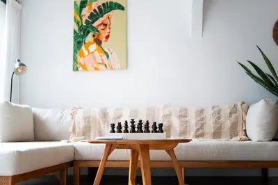 a living room with a white couch and a wooden coffee table at Charming 3 BR villa in the heart of Umalas in Canggu
