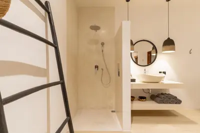 a bathroom with a shower and a sink at Villa Sora by Alfred in Bali in Seminyak