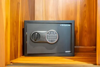 a small tv sitting on top of a shelf at Luxury 2BR Villas in Seminyak Central in Seminyak