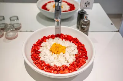 a bowl filled with red and white rice and a spoon at Luxury 2BR Villas in Seminyak Central in Seminyak