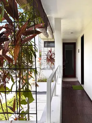 a staircase leading to a house with plants at Villa Hale Mahina, Bali in Kerobokan