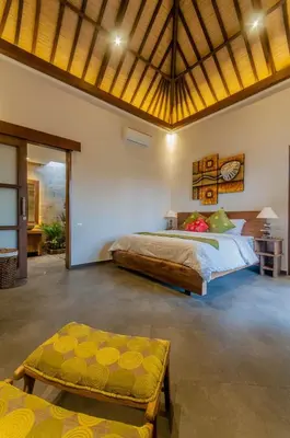 a bedroom with a large bed in a room at Boutique Modern Luxury in the Heart of Seminyak in Seminyak