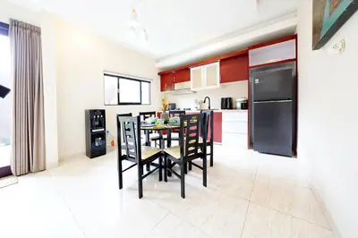 a kitchen with a table and chairs in a room at 3Bedrooms Villa with Pool West Sanur - Casa Del Sol in Sanur