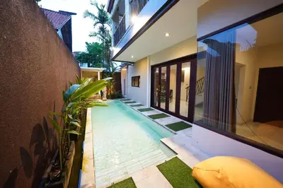 a swimming pool in the middle of a house at 3Bedrooms Villa with Pool West Sanur - Casa Del Sol in Sanur