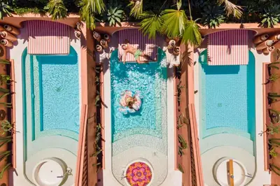 a view of a water slide at a water park at Tamasvini Romantic 1 BR Grand Private Pool Villa With Bathtub in Seminyak