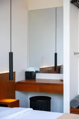 a bedroom with two beds and two chairs at Villa Aito, Luxury 3 BD Private Villa near Beach - Bali in Seminyak