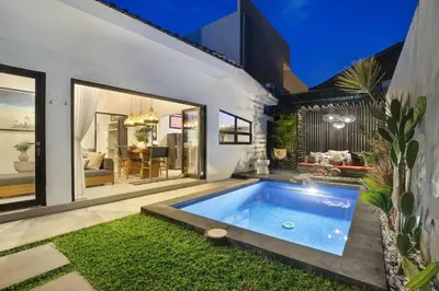 a swimming pool in the backyard of a house at Villa Suka Saki Seminyak with pool, wifi, & staff in Seminyak
