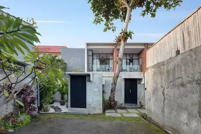 a house with two blue doors and a fence at 1BR Villa Private Pool Seminyak Mertanadi in Seminyak