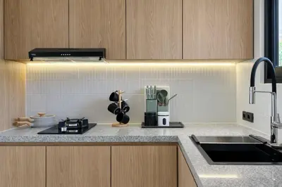 a kitchen with a sink and a counter top at Private Pool Villa Near Uluwatu in Jimbaran