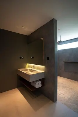 a bathroom with a sink and a mirror at 3 Bedroom Seminyak Apartment -3 in Seminyak