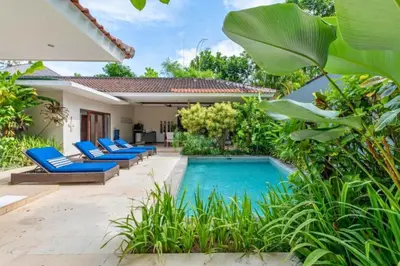 a pool in the backyard of a villa at Gahyaka Comfortable 2 BR Deluxe Private Pool Villa in Seminyak