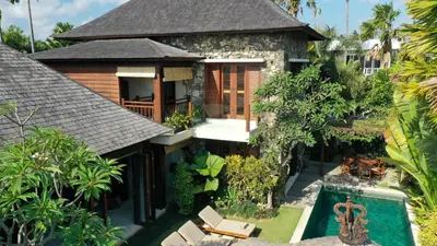 an aerial view of a house with a swimming pool at Villa Suar Drupadi in Seminyak