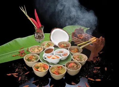 a bunch of food in small dishes on a table at Poppies Bali in Kuta