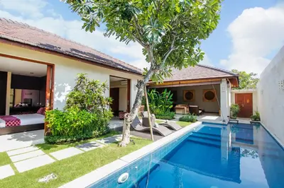 an image of a villa with a swimming pool at Samana Villas in Legian