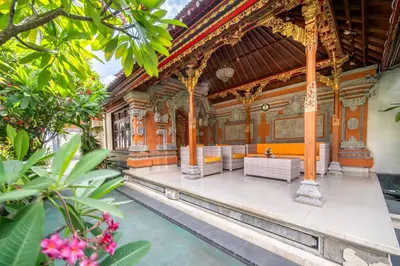 a temple in an indonesian temple with orange and yellow at The Kutaya in Kuta