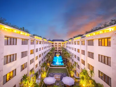 an aerial view of a courtyard in a building at Aston Kuta Hotel and Residence in Kuta